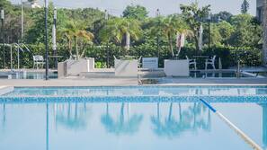 Outdoor pool, pool umbrellas, sun loungers