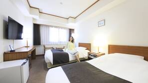Down comforters, desk, blackout drapes, iron/ironing board