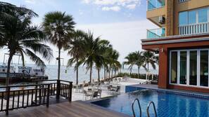 Outdoor pool, open 7:00 AM to 2:00 PM, pool umbrellas, sun loungers
