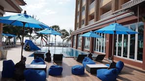 Outdoor pool, open 7:00 AM to 2:00 PM, pool umbrellas, sun loungers