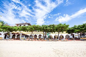 On the beach, white sand, beach shuttle, sun loungers