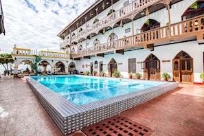 Outdoor pool, open 8:00 AM to 7:00 PM, sun loungers
