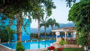 Outdoor pool, pool umbrellas, pool loungers