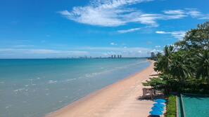On the beach, sun-loungers, beach towels