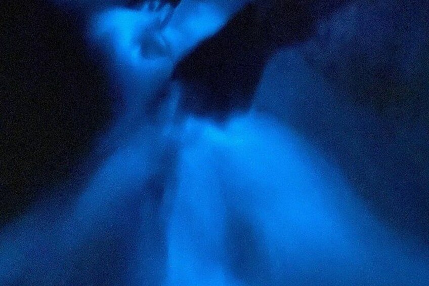 A blue light effect with a blurred face. 5