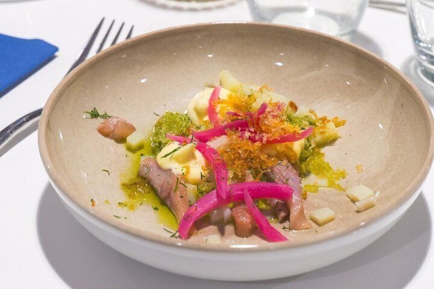 A plate of food with various ingredients. 2