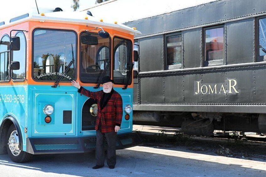 Guide Bob Collins with the Ringlings' personal train car, "Jomar." 3