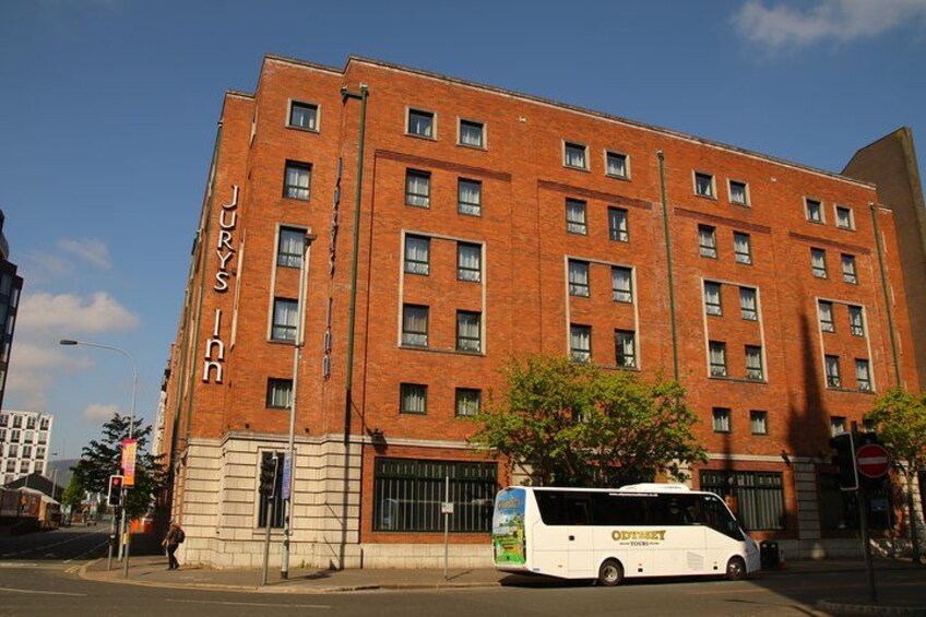A large brick building with the sign "JURYS INN" on the side. 3