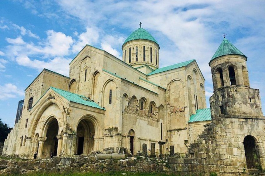 A historic church with multiple domes and bell towers. 1
