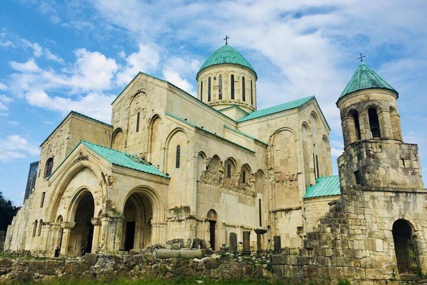 A historic church with multiple domes and bell towers. 1