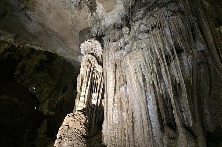 A cave with stalactites and stalagmites. 2
