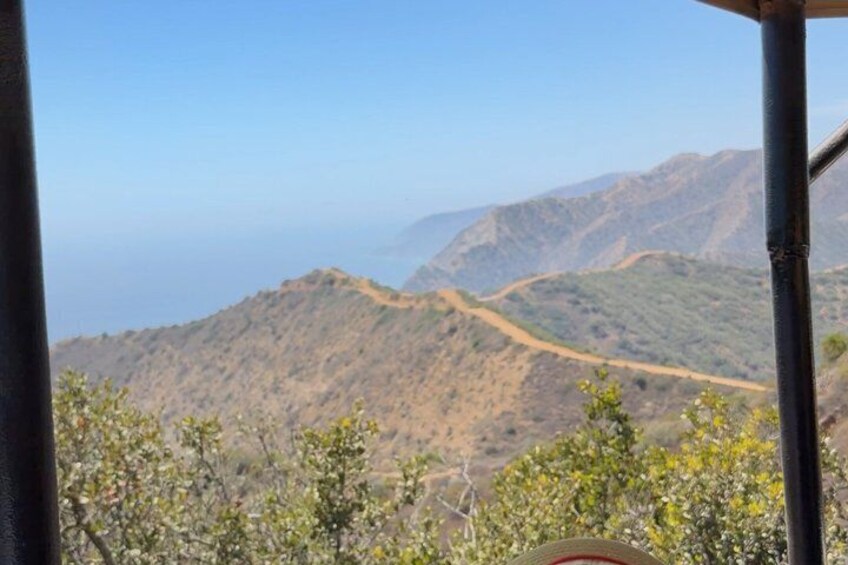 A mountainous landscape with a dirt path. 3