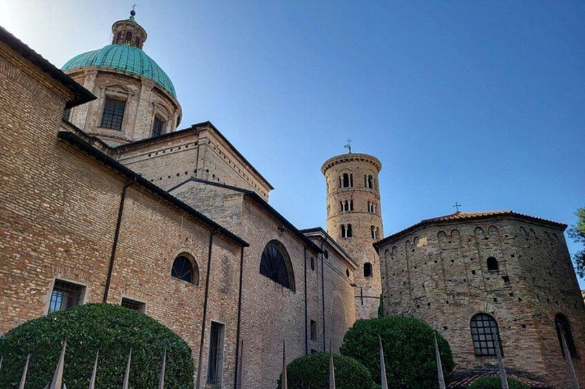 A historic building with a dome and a bell tower. 2