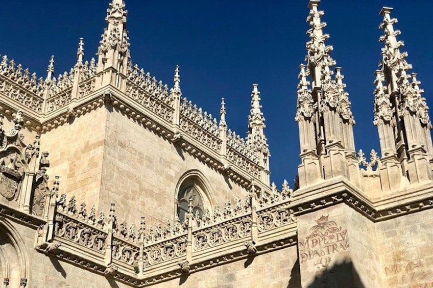 A Gothic-style building with intricate stone carvings and pointed arches. 3