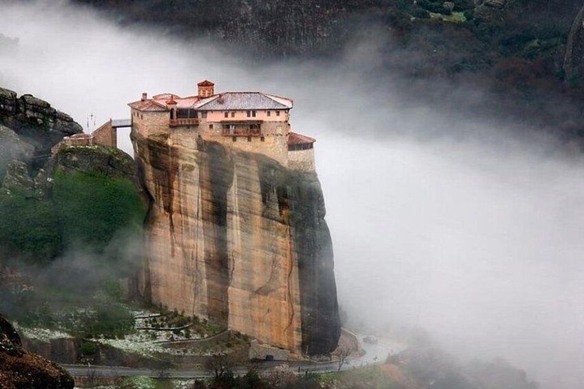A monastery perched on a cliff. 2