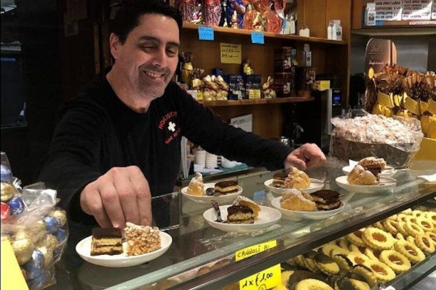 Local family owned pastry shop owner preparing our tastings. Food and wine tour Venice. 2