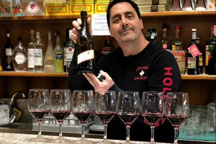 Owner of one of the stops we go to introduces the wine 3