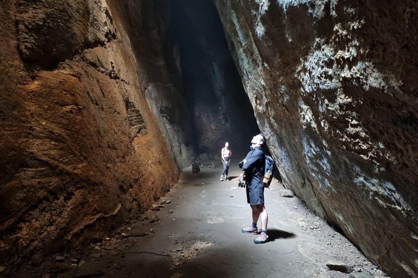 Exploring the depths of the Bat Cave, surrounded by mystery and natural beauty. 3