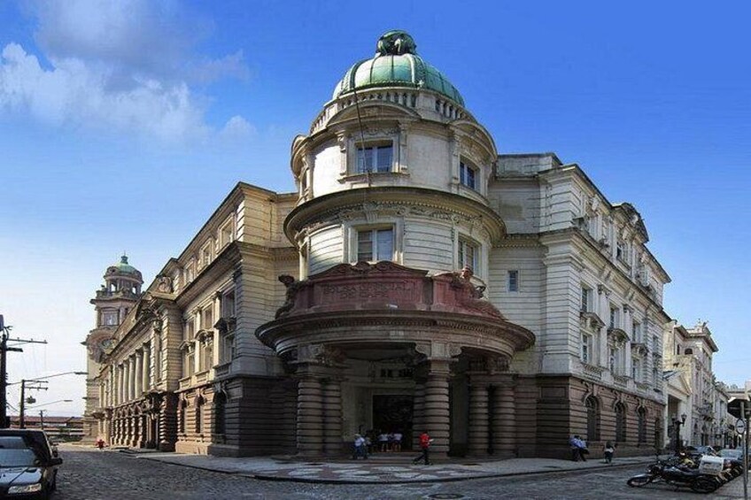 A historic building with a dome and classical architecture. 5
