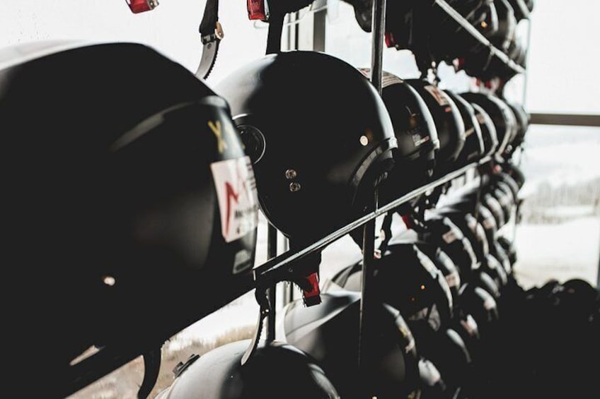A rack of black dumbbells with weight markings. 5