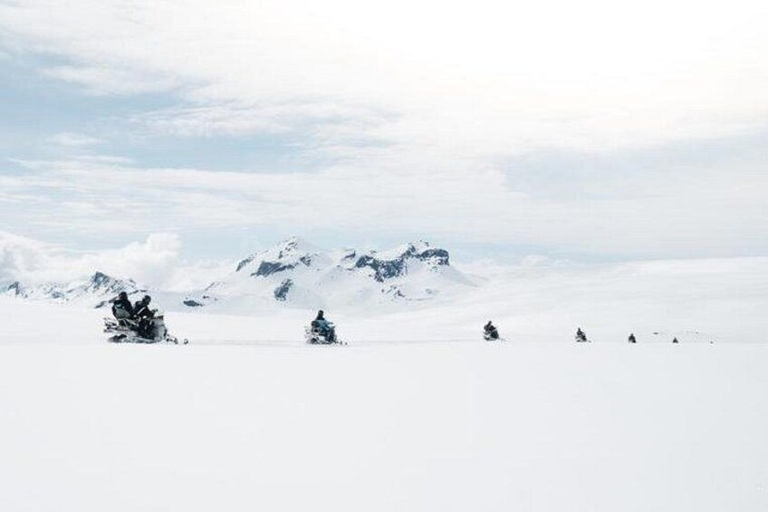 People snowmobiling 2