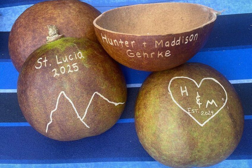 Three fruits with inscriptions, one bowl, and a blue striped surface. 5