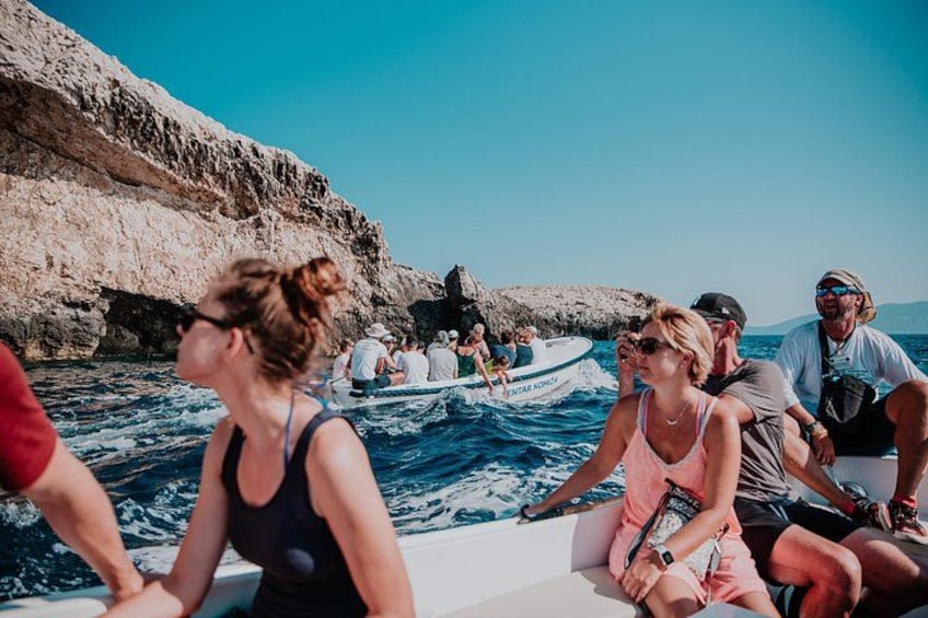 Exploring Blue Cave with small boat 2