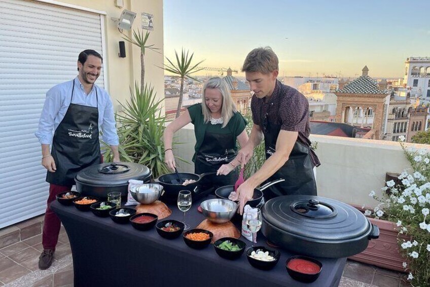 Exclusive Paella cooking class on private Rooftop with Seville's Cathedral View