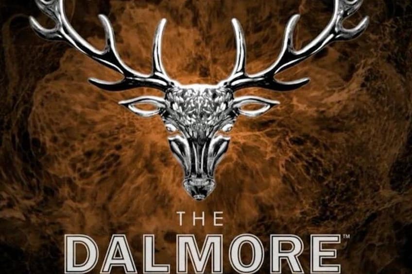 A metallic deer head with antlers against a textured background. 5