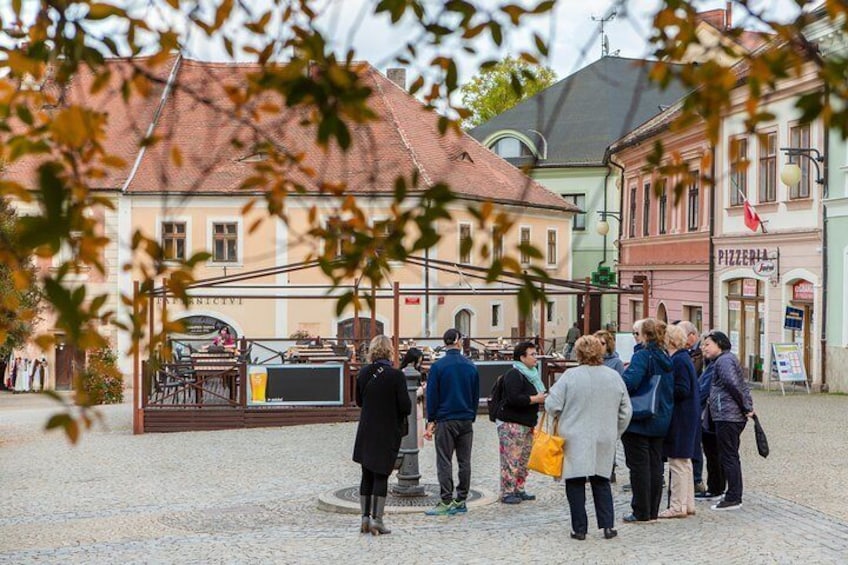 In the fall, the vibrant autumn leaves compliment the colorful Old Town buildings. 4