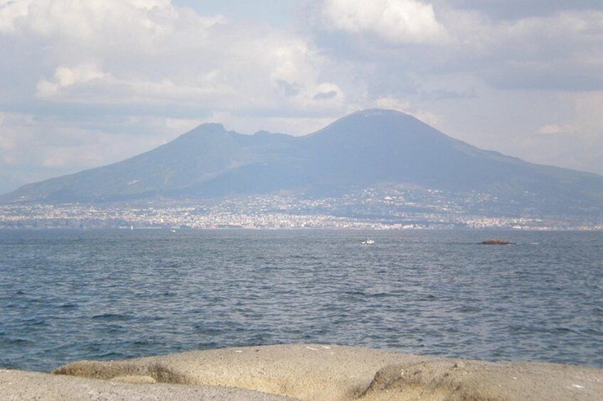 A coastal view with a mountain in the background. 3
