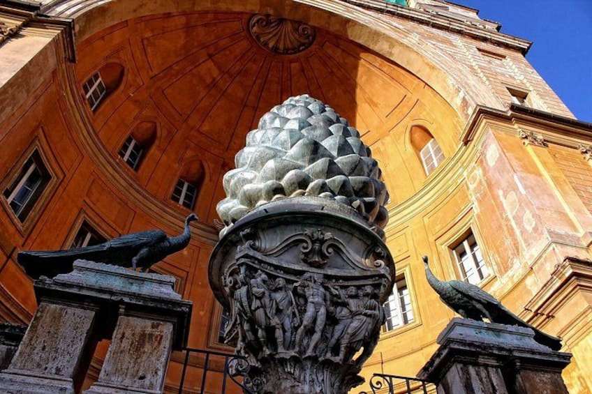 A building with a dome and a statue of an eagle. 3