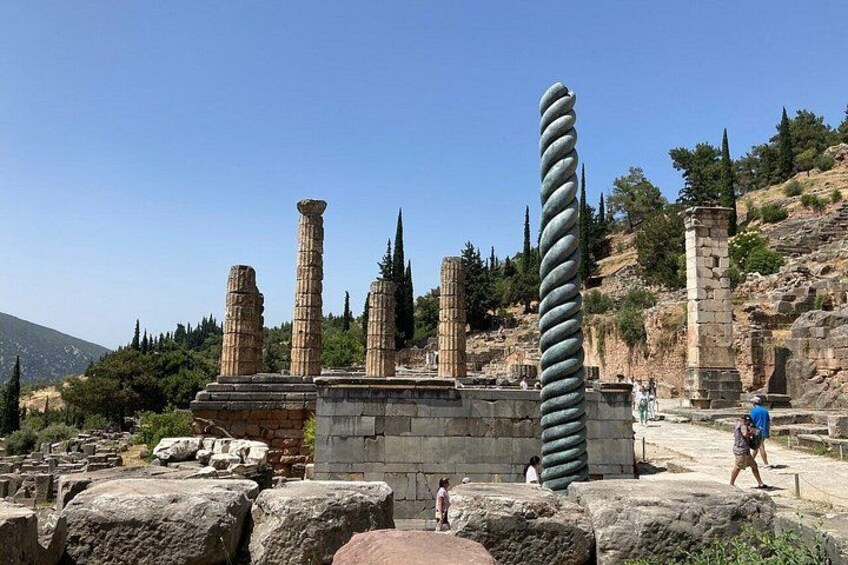 Ancient ruins with columns and stone structures. 1