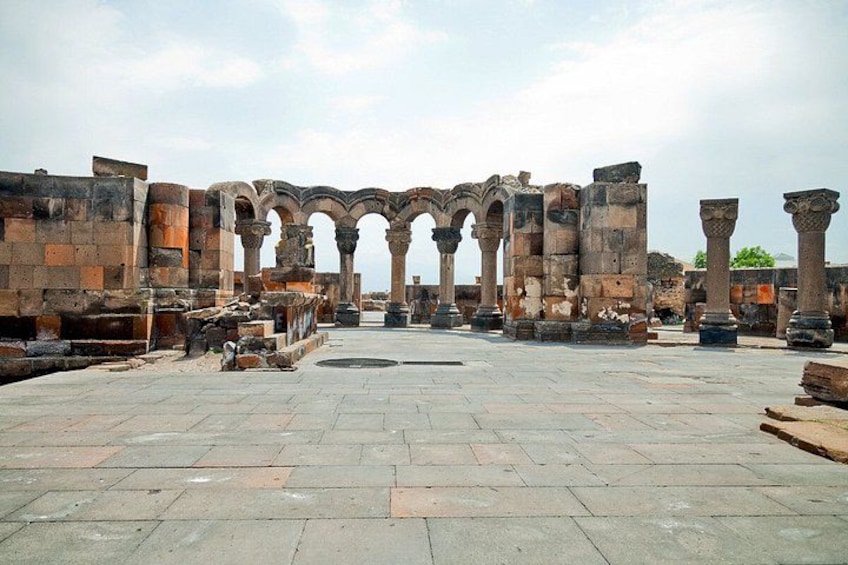 Ancient ruins with columns and arches. 5