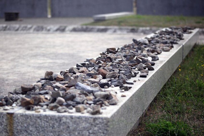 Pay respect at the grave sites, where the ashes of many victims were buried together 5