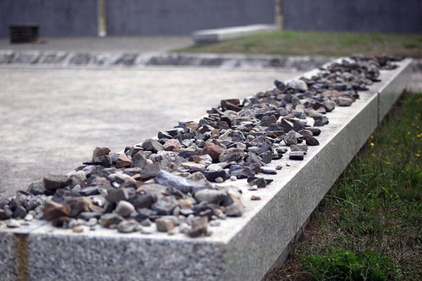 Pay respect at the grave sites, where the ashes of many victims were buried together 3