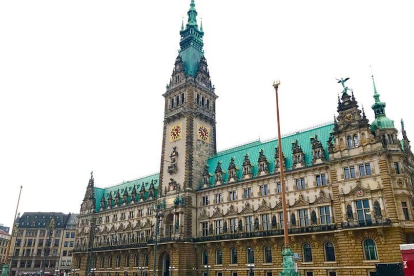 A historic building with a clock tower and ornate architecture. 3