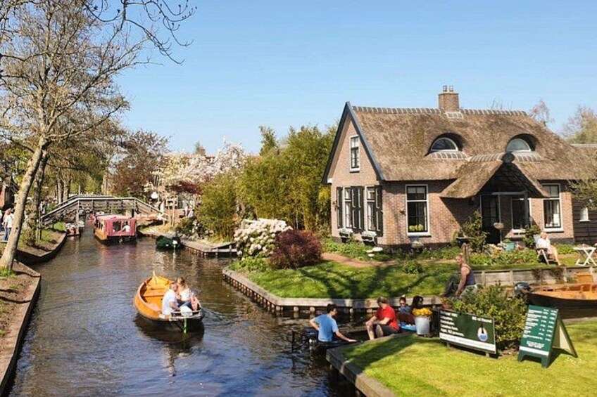 We are taking 'Whisper Boat' cruising around Giethoorn. 4