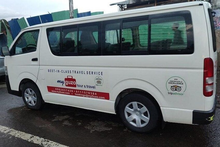 An AC equipped minibus ready for customer pickups 5