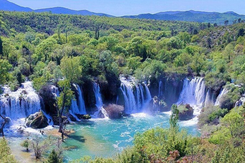 Kravice waterfalls are a place where we just leave you to have fun, swim, dive from a cliff, splash, ride a canoe, grab a selfie under one of the biggest waterfalls in the Balkans. 1