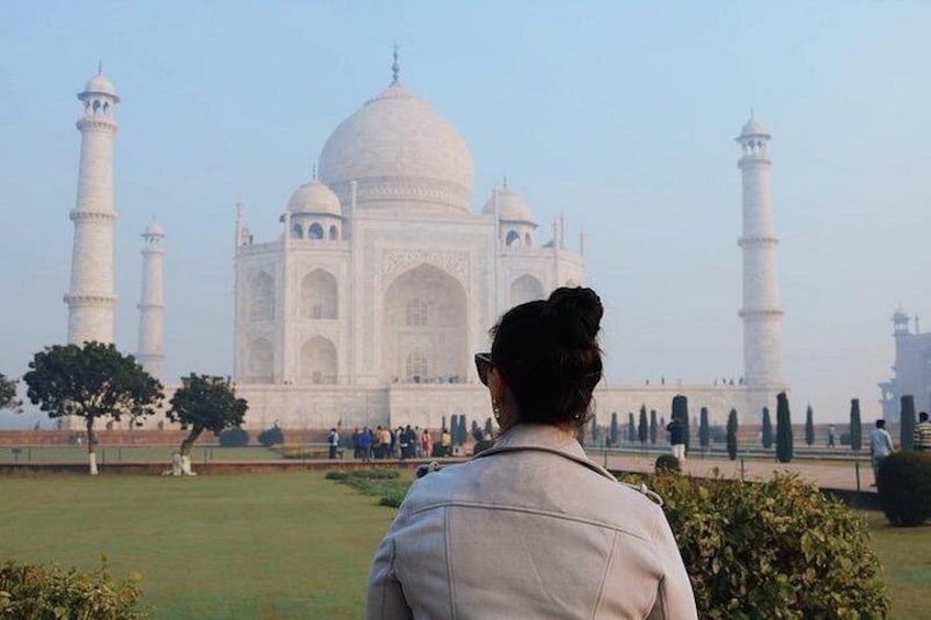 The Taj Mahal with a person in the foreground. 3