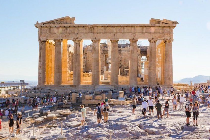 The Parthenon in Athens with tourists around. 2
