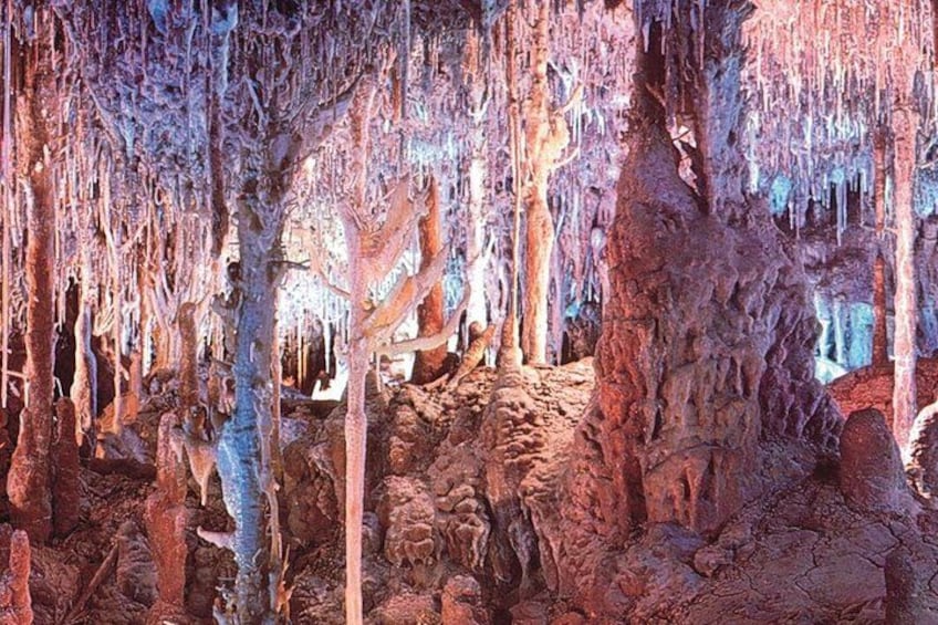 A cave with stalactites and stalagmites. 5