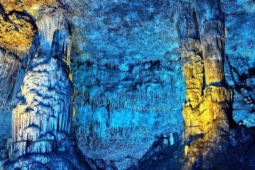 A cave with stalactites and stalagmites. 2