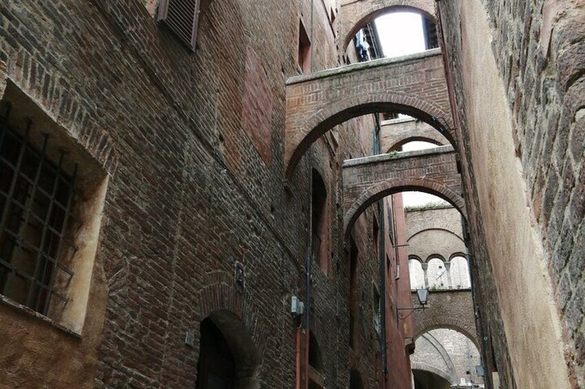 Medieval alley with arches 4