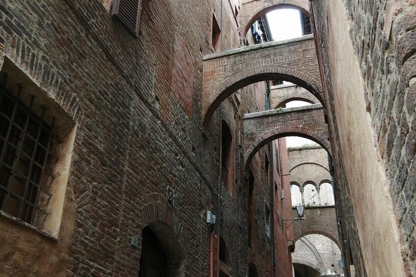 Medieval alley with arches 4