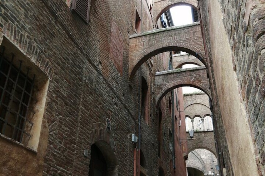 Medieval alley with arches 5