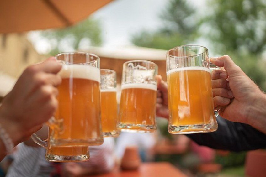 People holding beer mugs. 2