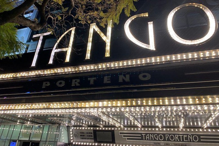 A building with illuminated signage reading 'TANGO PORTENO'. 3