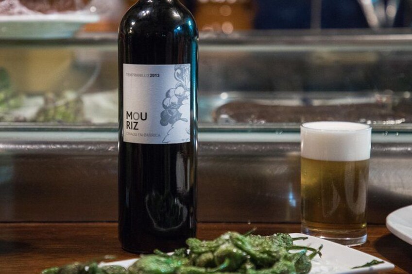 Padrón peppers are blistered and salted for a tasty snack, best paired with beer or wine. 2